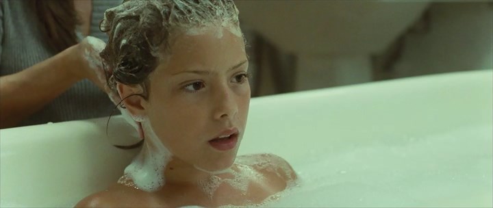 Bath scene with 11-year-old Claudia Vega. 